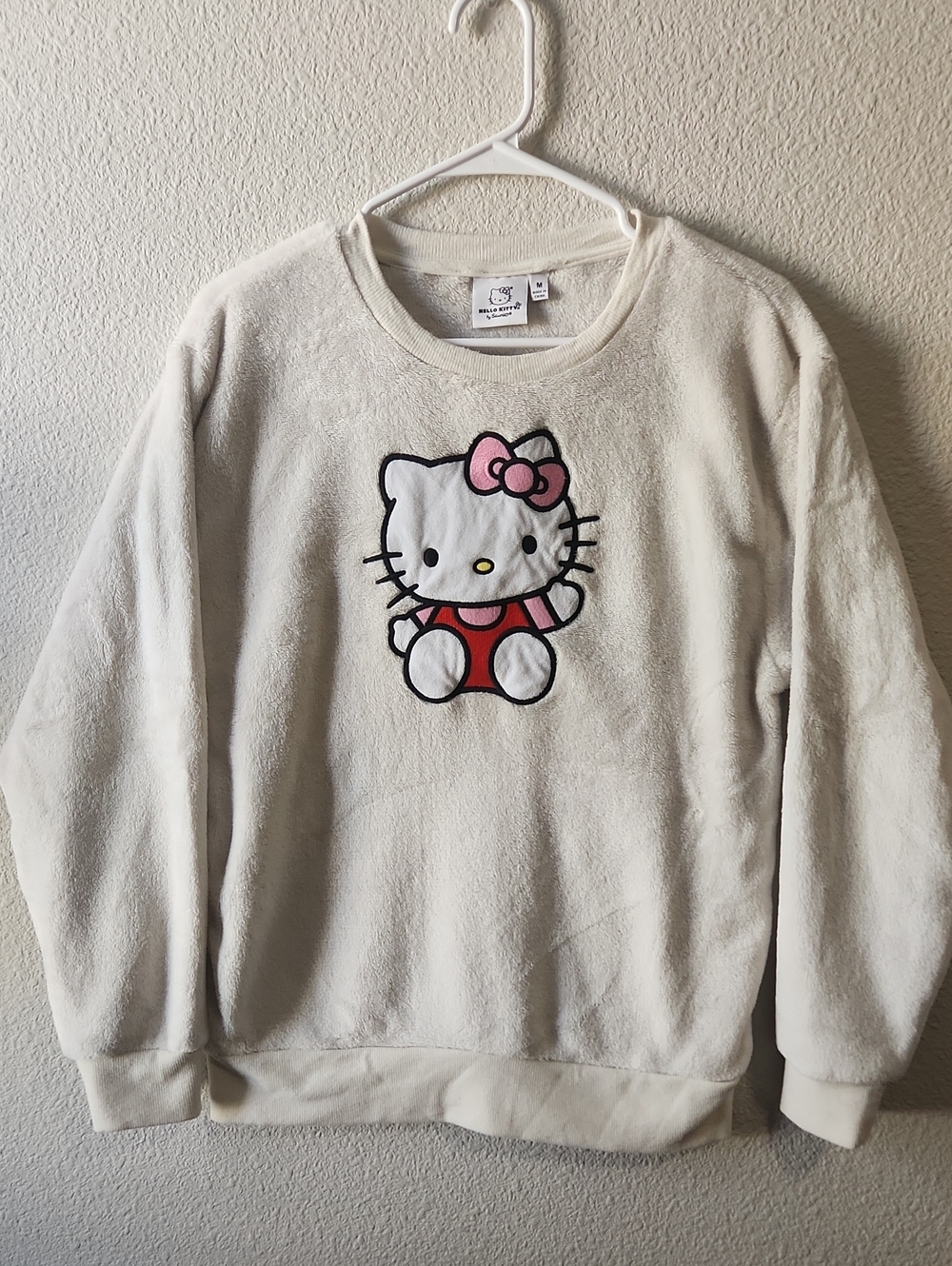 Hello Kitty Cream Plush Crewneck with Pink Bow and Red Outfit